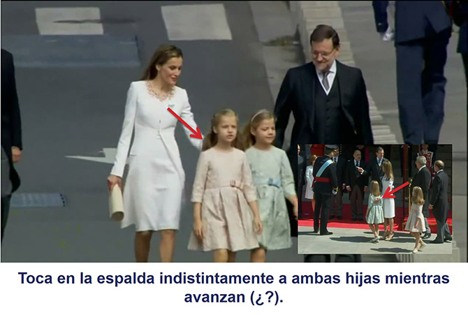 La reina Letizia toca instintivamente a ambas hijas mientras avanzan